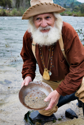 miner with gold pan